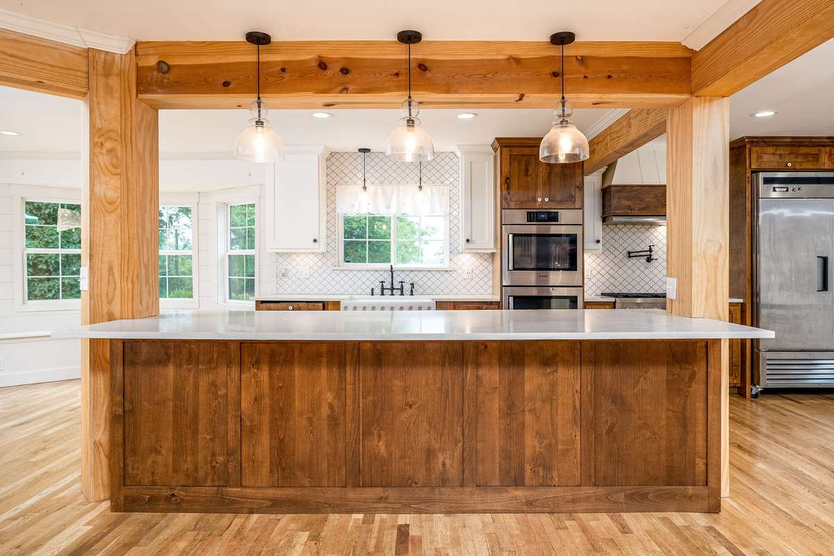 Exposed wooden beams for the modern and updated look- Spacious sit down island