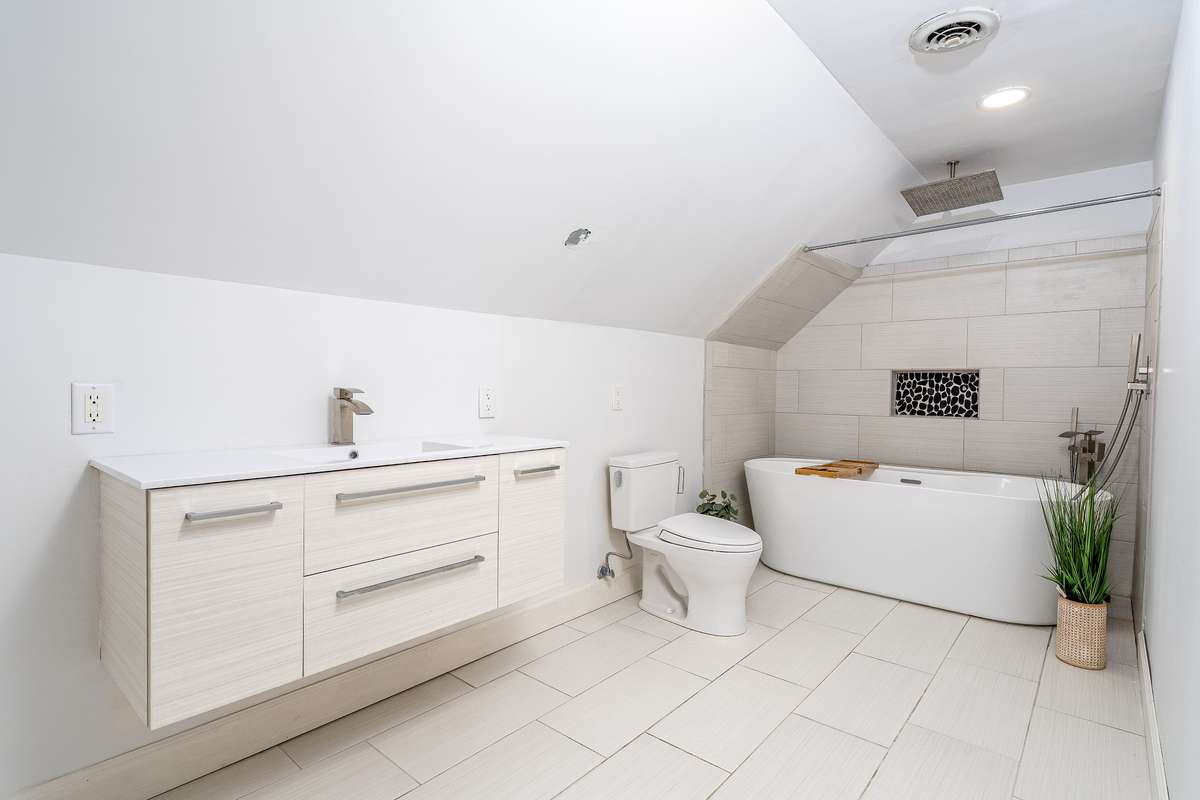 Upstairs Full Bath with Soaking tub and Floating Cabinet, Tiled floor and wall