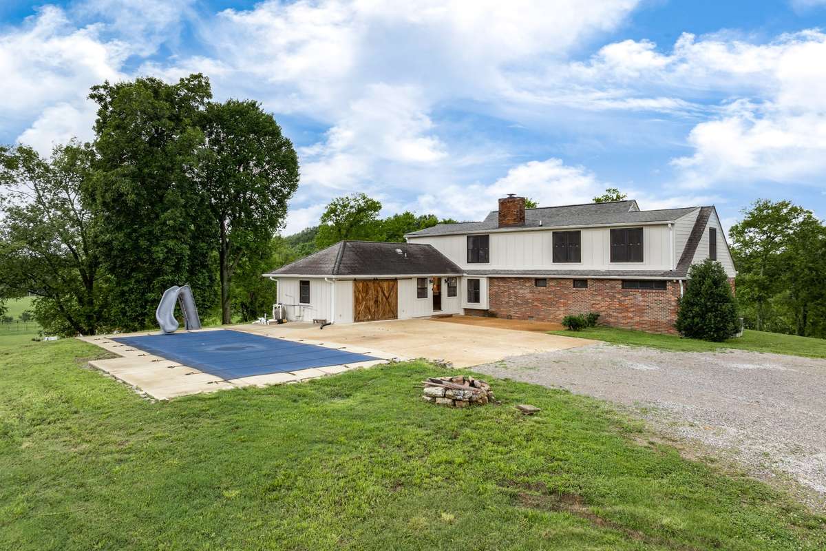 Pool Cover and Slide stay with the house