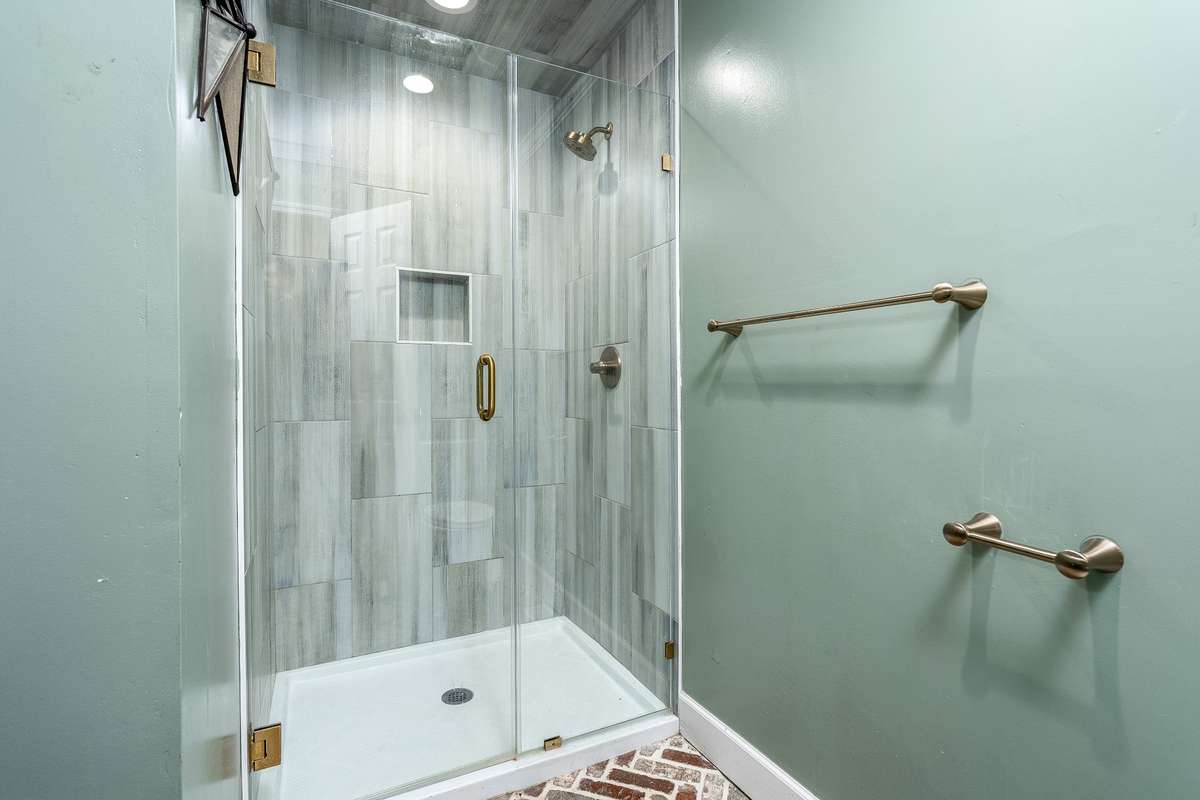Full Bath also has stand up tiled shower