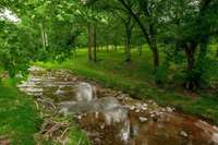 Always rolling, this beautiful creek greets you and your guests upon arrival.