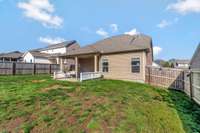 Fully Fenced Backyard with Great Green Space!