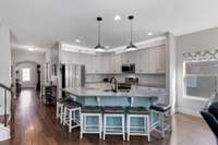 Spectacular Kitchen Island with Granite Countertop Offers Ample Seating Around!