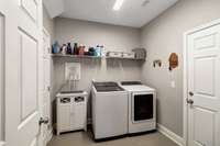Utility Room with Storage Closet