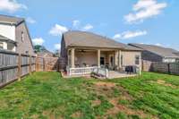 Fully Fenced Backyard with Great Green Space!