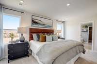This is a photo of one of our model homes. Please know that some of the exterior and interior finishes, paint, and features may vary.