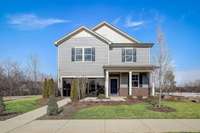 This is a photo of one of our model homes. Please know that some of the exterior and interior finishes, paints, and features may vary.