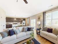 This is a photo of one of our model homes. Please know that some of the exterior and interior finishes, paint, and features may vary.