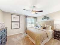 This is a photo of one of our model homes. Please know that some of the exterior and interior finishes, paint, and features may vary.