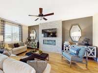 This is a photo of one of our model homes. Please know that some of the exterior and interior finishes, paint, and features may vary.