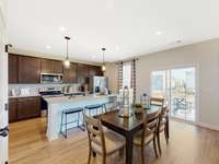 This is a photo of one of our model homes. Please know that some of the exterior and interior finishes, paint, and features may vary.