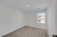This is a photo of one of our model homes. Please know that some of the exterior and interior finishes, paint, and features may vary.