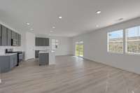 This is a photo of one of our model homes. Please know that some of the exterior and interior finishes, paint, and features may vary.