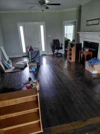 Living room with crown molding.
