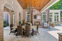 Complete with and outdoor fireplace, decorators chandeliers and tongue and groove ceiling-perfect for watching football or dining in the Fall!