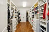 Storage galore, walk in closet with custom features and additional closet in back