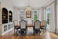 Large dining room space, with doors that open to the courtyard.