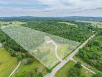 26.44 acres partial fenced with pasture and woods