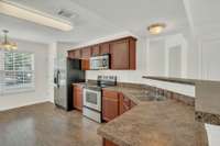 Notice the matching stainless steel appliances!