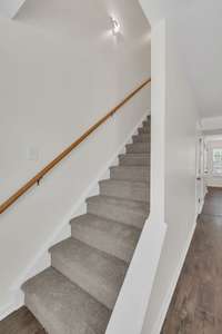 Let's head upstairs. Notice the new carpet that was just installed.