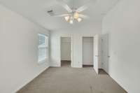 Bedroom #2 with two closets! One of them is a walk-in closet