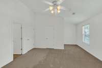 This is the main bedroom with two closets.  One of them is a large walk in closet