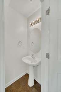 It's always great to have a half bath just off of the den and kitchen!