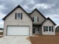 Photo of different home but same floor plan. Finishes will vary.