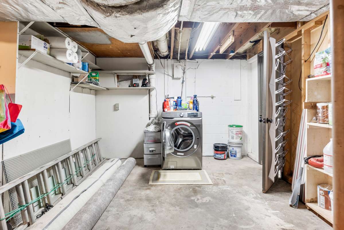 Part of the unfinished side of the basement