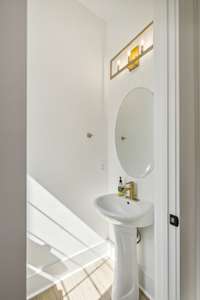 A powder bath is always a classy touch.* Model home photos for representation, actual features and finishes may vary.