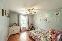 Third bedroom with a nice view of the front porch and the lake