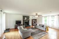 SO much space in this house and natural light!  The fireplace is wood burning.