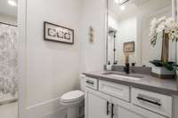 Full bath that could function with 5th bedroom.