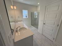 *These photos are of a model home and are finishes are not exactly the same as home being built*