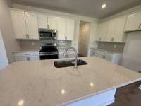 *These photos are of a model home and are finishes are not exactly the same as home being built*