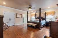 The primary bedroom awaits with crown molding, hardwood floors, & private bathroom. 532 Johnstown Dr. Smyrna, TN 37167