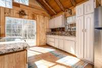 Double Window off the Kitchen offers more natural lighting - Double door Kitchen pantry