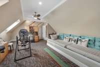 There is also a staircase to additional attic storage.
