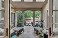 The covered lanai includes skylights and access from the living space and screened porch.