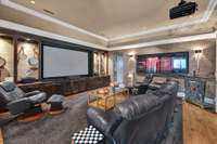 The audio-visual home theatre room has a 110' screen, theatre and sound equipment.