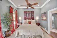 Additional bedroom suite with adjoining full bath and walk-in closet.