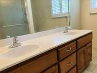 Owner's Bathroom also features double vanities