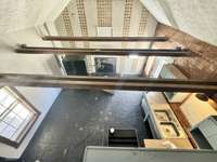 2669 Lick Creek: Front Unit balcony view of kitchen and living room