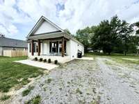 Ample parking with two entry doors from driveway