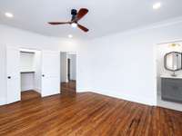 Upstairs back bedroom 13x16 with walk-in closet and half bath attached