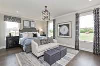 Photos are of the model home. Listing is for a to be built home. Primary Bedroom!
