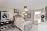 Photos are of the model home. Listing is for a to be built home. Guest Bedroom!