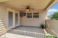 Fantastic Covered Patio for entertaining.  Enjoys lazy afternoons relaxing under the ceiling fan and privacy with the fence.