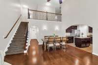 Beautiful arched doorways between kitchen and entry foyer.