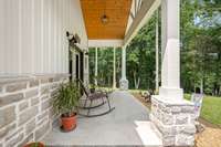 Front porch great for looking out into the private front yard.